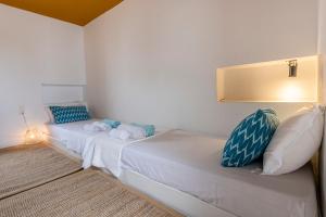 Postel nebo postele na pokoji v ubytování Hidesign Athens Villa In Sounio