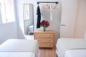 Postel nebo postele na pokoji v ubytování Rambla de Mar Apartments
