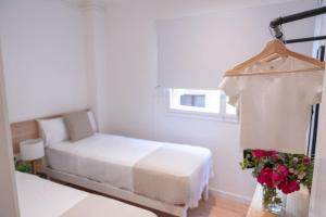 Postel nebo postele na pokoji v ubytování Rambla de Mar Apartments