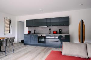 Kuchyň nebo kuchyňský kout v ubytování Ferienapartments Seepark Möhnesee + 23 fotografií
