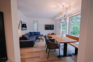 TV a/nebo společenská místnost v ubytování Ferienapartments Seepark Möhnesee