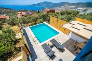 an image of a swimming pool in a villa at KaşKalkan Honeymoon Villa with Seaview in Kalkan