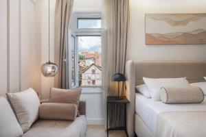 Postel nebo postele na pokoji v ubytování Luxury rooms Le Prestige Few Minutes from Split's Iconic Waterfront