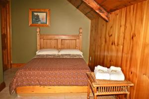 Postel nebo postele na pokoji v ubytování Manoir Ramezay + 37 fotografií