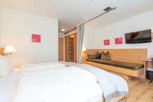 Voodi või voodid majutusasutuse Hotel Alpenrose toas