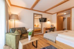 Voodi või voodid majutusasutuse Hotel Alpenrose toas