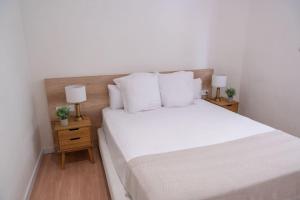 Postel nebo postele na pokoji v ubytování Rambla de Mar Apartments