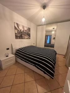 Postel nebo postele na pokoji v ubytování Indomabile Home Como