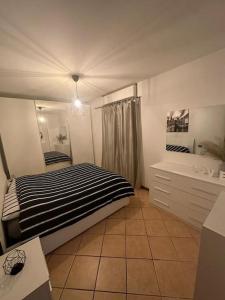 Postel nebo postele na pokoji v ubytování Indomabile Home Como