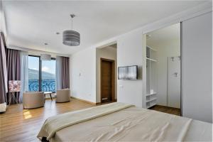 Beachfront villa Pearl of Adria客房内的一张或多张床位