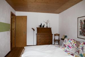 Postel nebo postele na pokoji v ubytování Fiesch-Lax Minnig Moritz