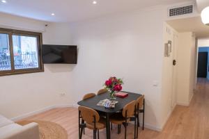 TV a/nebo společenská místnost v ubytování Rambla de Mar Apartments