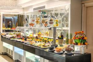 a buffet line with many different types of food at Hotel Ipek Palas in Istanbul