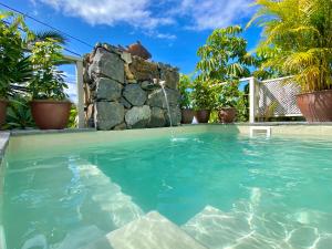 Bazén v ubytovaní Casa Plumeria, a Private paradise with Pool. alebo v jeho blízkosti