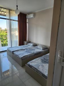 Postel nebo postele na pokoji v ubytování Vizitori Hotel + 37 fotografií