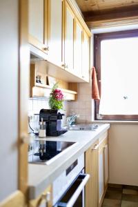 a kitchen with a sink and a counter top at Jordis in Vandans