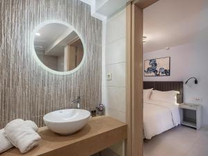 Koupelna v ubytování M City Hotel