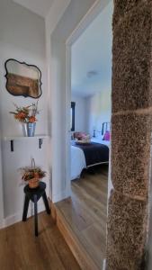 Postel nebo postele na pokoji v ubytování Casa da Penela