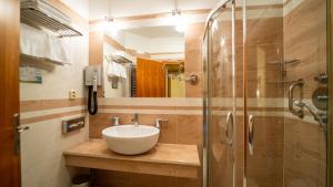 Koupelna v ubytování Hotel Richard Spa & Wellness