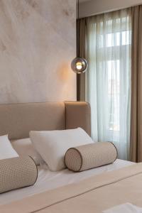 Luxury rooms Le Prestige Few Minutes from Split's Iconic Waterfront客房内的一张或多张床位