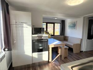 Η κουζίνα ή μικρή κουζίνα στο Ambra Dream Home