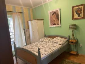 Postel nebo postele na pokoji v ubytování Villa Éden