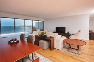 TV a/nebo společenská místnost v ubytování Porto Ocean flat