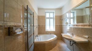 Koupelna v ubytování Hotel Richard Spa & Wellness