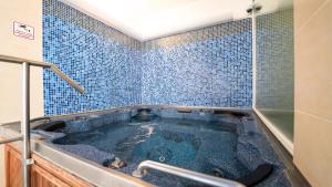 Koupelna v ubytování Hotel Richard Spa & Wellness