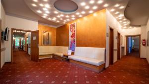 Postel nebo postele na pokoji v ubytování Hotel Richard Spa & Wellness