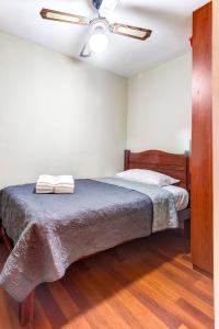 En eller flere senge i et værelse på Apartamento Estela en Alameda Colonial - Aeropuerto Jorge Chávez