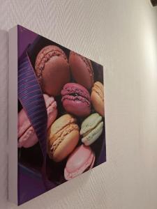 a bunch of donuts in a box on a wall at T2 vue sur La Place Plumereau in Tours