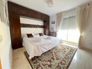 Postel nebo postele na pokoji v ubytování Penthouse - residence La Mina - Albir avec WIFI GRATUIT + 28 fotografií