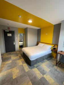 Krevet ili kreveti u jedinici u okviru objekta Fitzsimons Hotel Temple Bar