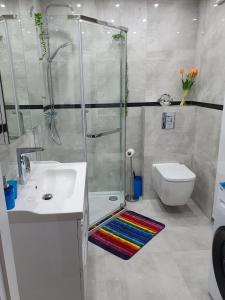Kúpeľňa v ubytovaní Apartament Comfort Del Mar IV Kolobrzeg