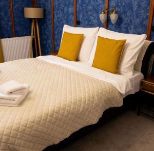 Postel nebo postele na pokoji v ubytování Hotel Litovel
