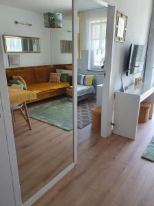 Telewizja i/lub zestaw kina domowego w obiekcie Apartament Comfort Del Mar V