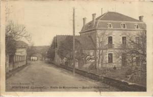 an old photo of a house and a street at Le Jardin Umal in Montendre