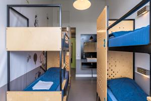 Ein Bett oder Betten in einem Zimmer der Unterkunft Stayokay Hostel Amsterdam Oost