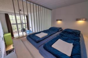 Ein Bett oder Betten in einem Zimmer der Unterkunft Stayokay Hostel Amsterdam Oost