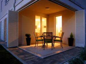 Patio alebo iná vonkajšia časť ubytovania Momentum Apartment