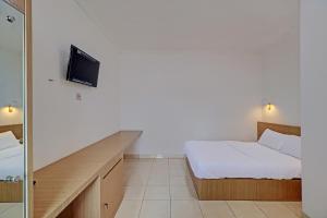 Postel nebo postele na pokoji v ubytování Guest House Simalem