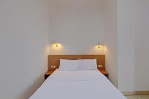 Postel nebo postele na pokoji v ubytování Guest House Simalem