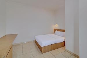 Postel nebo postele na pokoji v ubytování Guest House Simalem