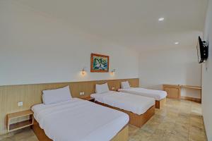 Postel nebo postele na pokoji v ubytování Guest House Simalem
