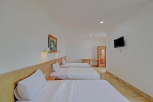 Postel nebo postele na pokoji v ubytování Guest House Simalem