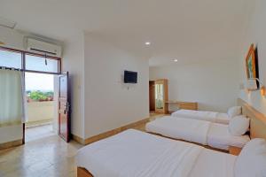 Postel nebo postele na pokoji v ubytování Guest House Simalem
