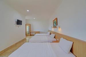 Postel nebo postele na pokoji v ubytování Guest House Simalem