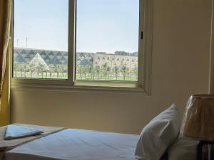 Katil atau katil-katil dalam bilik di Gem Overlooking inn