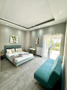 Säng eller sängar i ett rum på ENDLESS BLUE Dream Villa